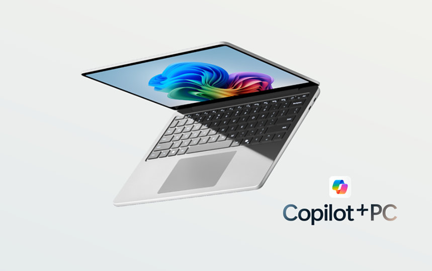 A  Surface Laptop, Copilot+ PC, 13-inch in the colour Platinum.