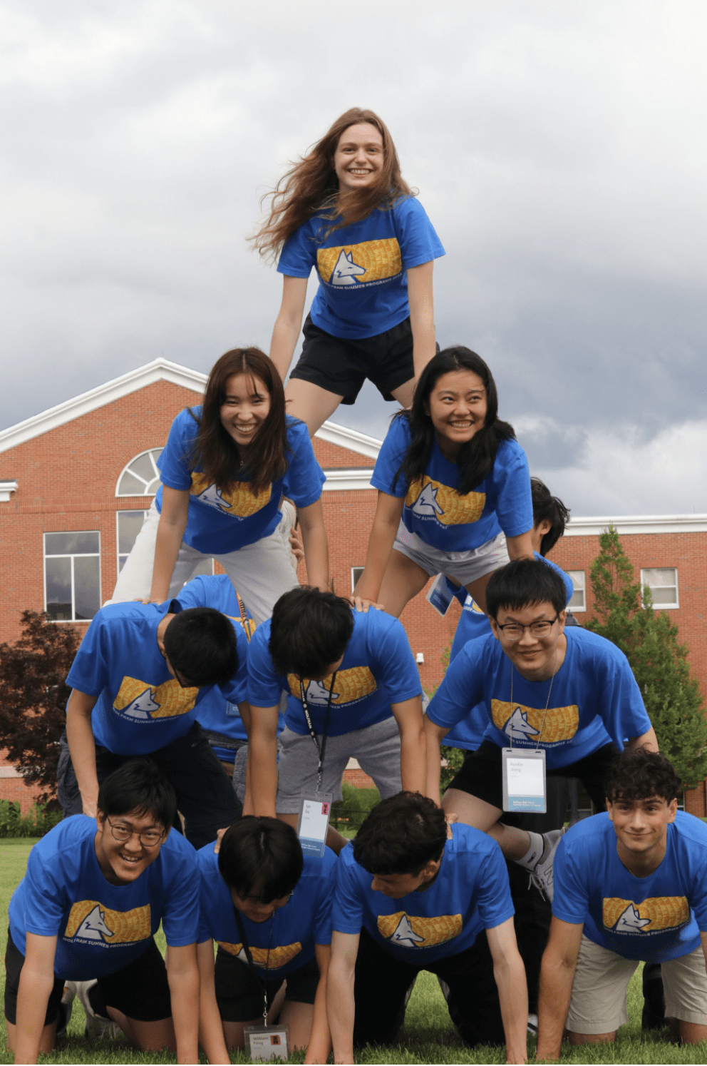 Students stacked in a pyramid
