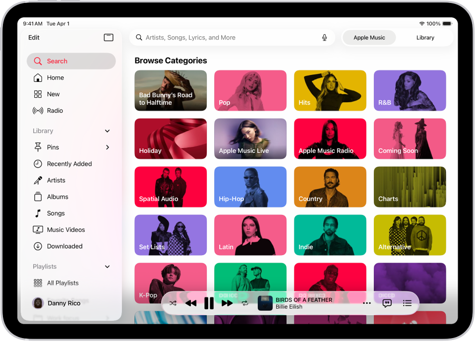 Cilnes Search kreisajā malā ir redzama sānu josla un augšā — meklēšanas lauks. Zem meklēšanas lauka ir redzamas dažādas mūzikas kategorijas. MiniPlayer ir apakšā.