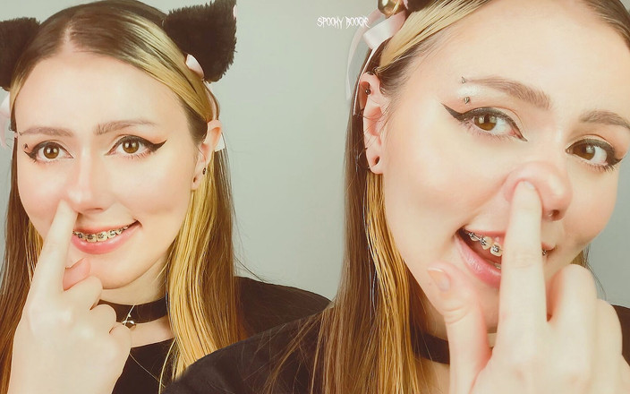Spooky Boogie: E-girl en frenillos está pellizcando su linda nariz delante de...