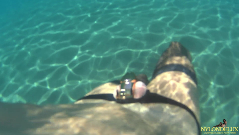 Nylondelux: Peniscage&amp;stocking in the Sea